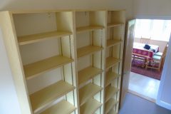 Ash bookcases with adjustable shelving