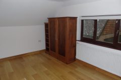 Made to measure Sapele wardrobes with a wax finish