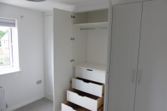 Bespoke painted double wardrobes & built in oak drawer unit