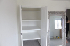 White painted alcove bespoke cupboard