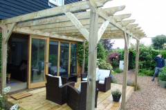 Bespoke oak timber garden gazebo with decked area